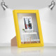 Фоторамка дерев'яна 15х21 (А5) багет: AH2220-05 Жовтий (з глянцевим прозорим пластиком 0.8мм, двп з ніжкою) EmojiFrame